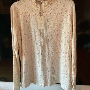 Cream Long Sleeve Top with Pattern. GOLF for women